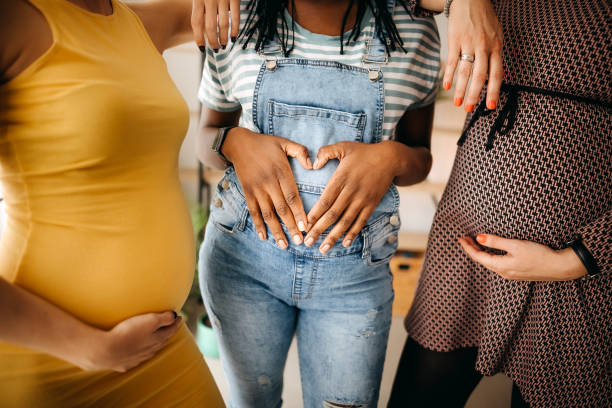 Women enjoy pregnancy stock photo