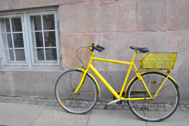 istock Old yellow bike 1389512773