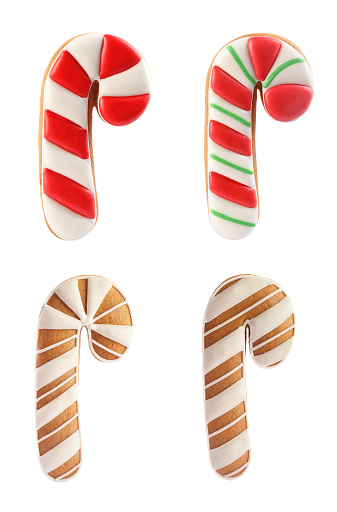 Set of Christmas candy cane shaped cookies on white background