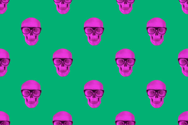 Purple skulls on green background. Seamless repeating pattern. Digital collage.