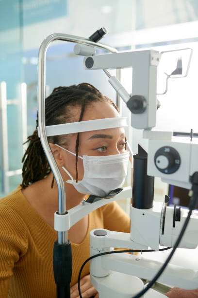 istock Woman Ggetting Eyesight Checked 1389516647