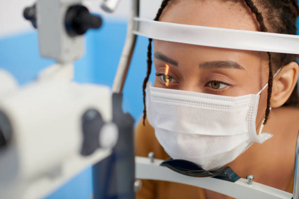 Patient Getting Examined With Slit Lamp