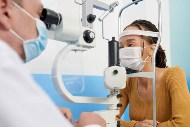 istock Woman Getting Examined With Autorefractometer 1389516663