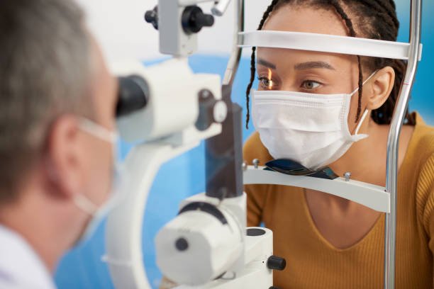 istock Black Woman Having Eyes Examined 1389516674