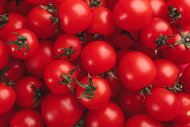 istock Many fresh cherry tomatoes as background, closeup 1389520033