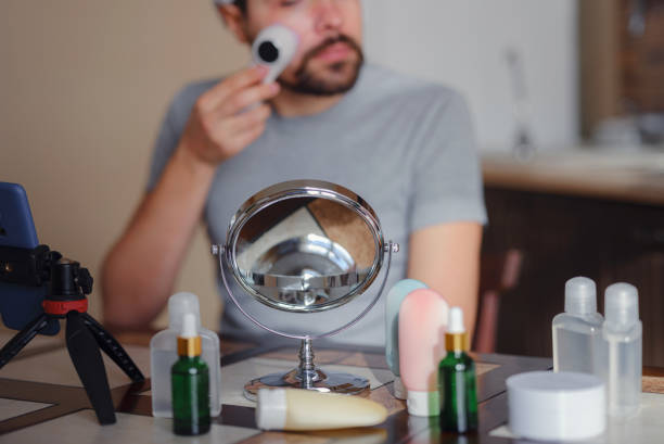 istock Men's beauty concept. caucAsian guy checking his skin. 1389521542