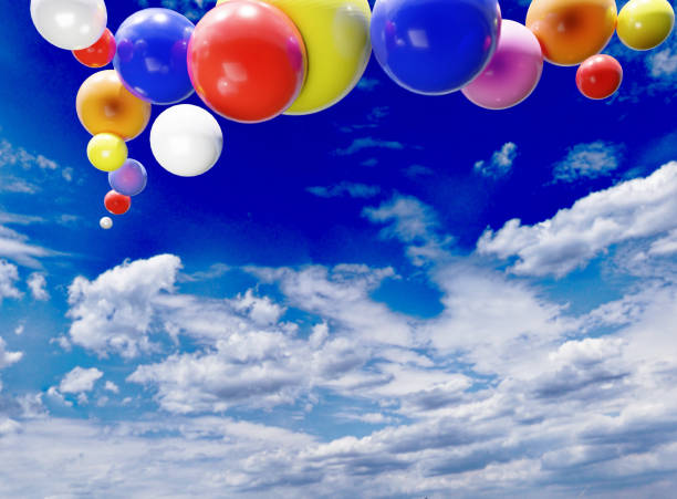 balloons flying up on sky background stock photo