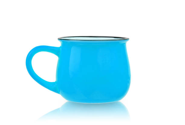 istock ceramic cup of colored glaze isolated on a white background 1389525626