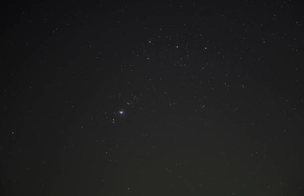 istock Starry night sky with Orion galaxy.  Astronomical background. 1389532516