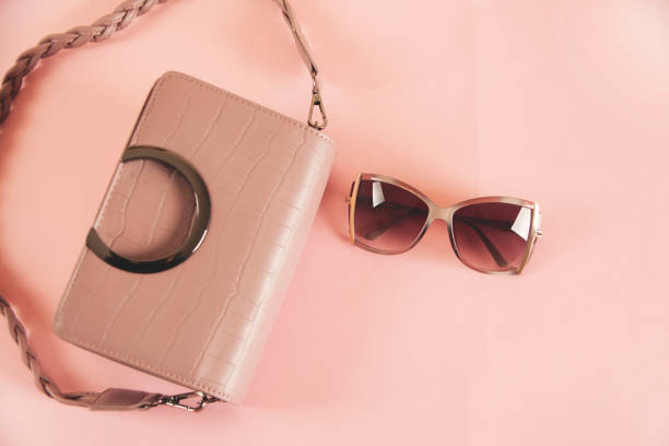 istock woman bag pink sunglasses 1389539624