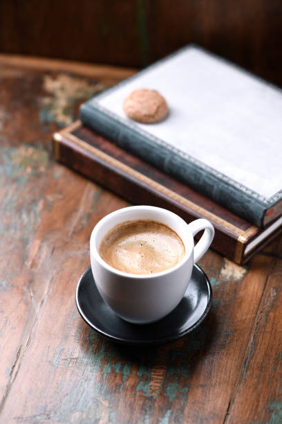 istock Cup of coffee on rustic wooden background. Copy space. 1389539910