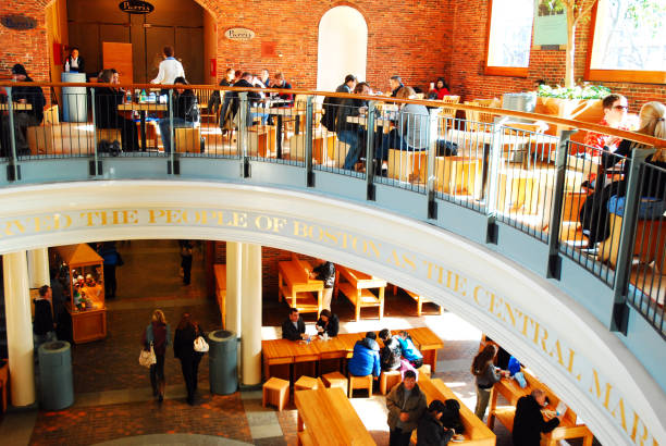 Boston, MA, USA February 5  A lunch crowd gathers to eat at the food court in Quincy Market in Boston