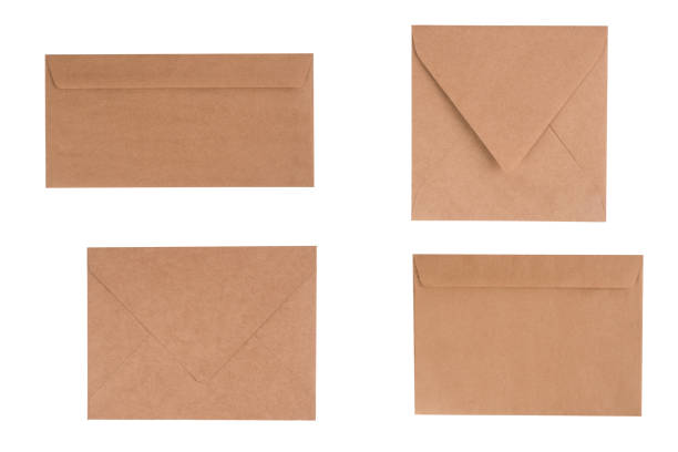 istock Brown kraft paper envelope of four different types isolated on white background for your design project. Letter, top view 1389541249