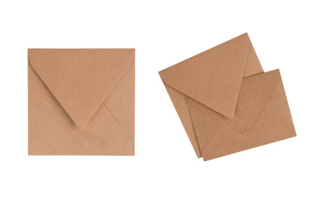 istock Mockup image of brown kraft paper envelope front and back isolated on white background for your design project. Letter, top view, set of envelopes 1389541250