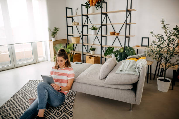istock Woman working on digital tablet at home 1389544326
