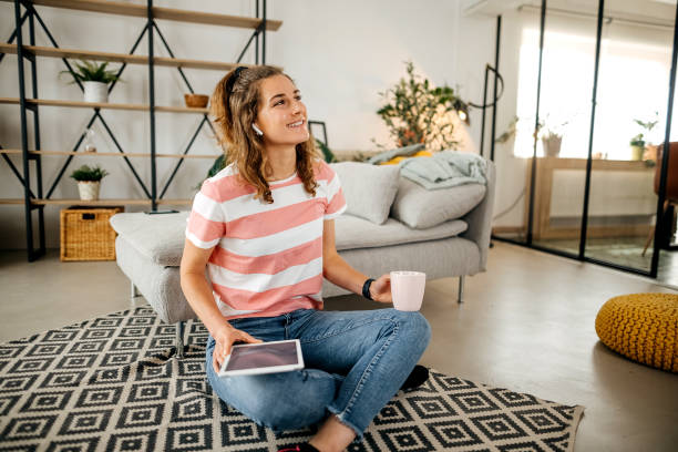 istock Woman working on digital tablet at home 1389544376