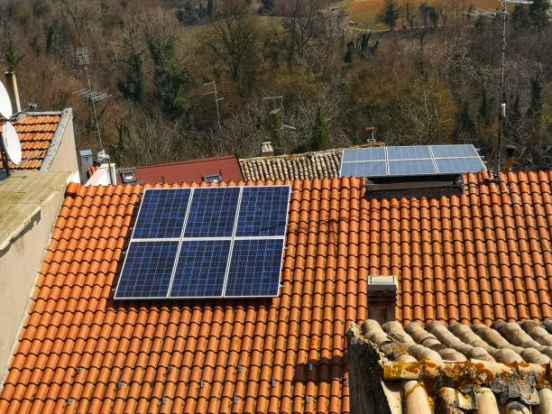 istock solar panels on private house roofs 1389545067