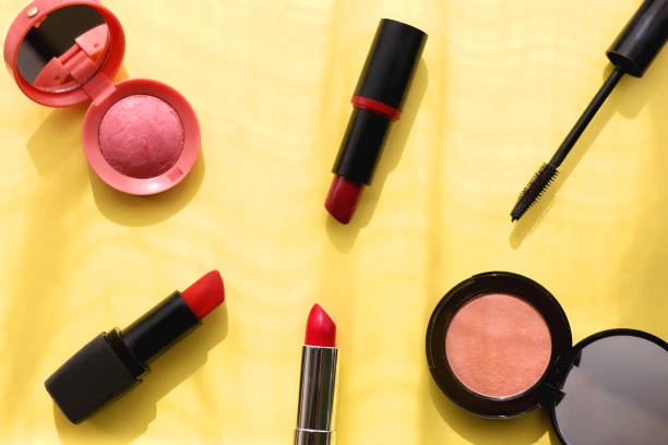 istock Make Up Products on Yellow Background 1389546305