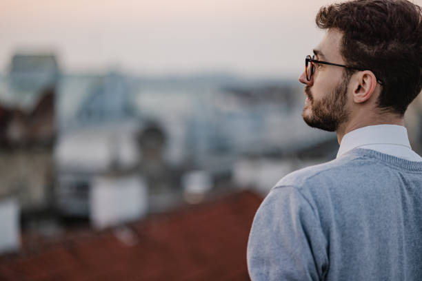 istock Young man looking in the distance 1389546660
