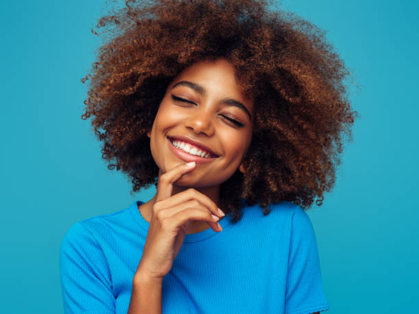 istock Beautiful afro woman 1389547328