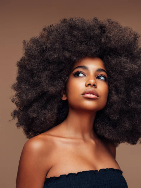 istock Beautiful girl with curly hairstyle 1389547455