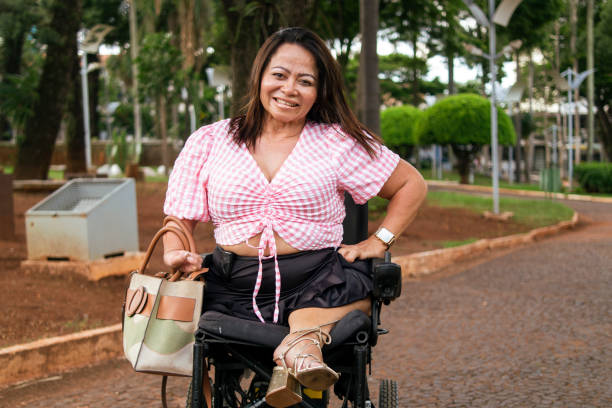istock Woman with disability at the park. 1389551542