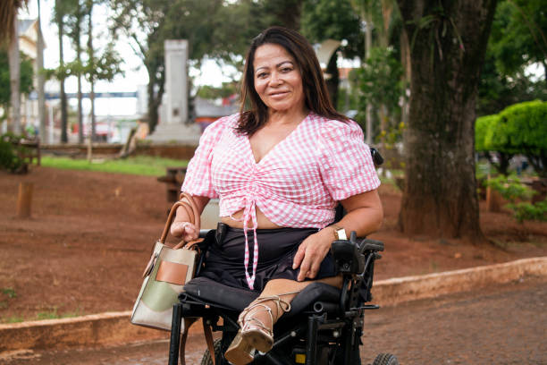 istock Woman with disability at the park. 1389551548