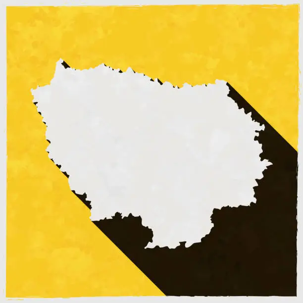 Vector illustration of Ile-de-France map with long shadow on textured yellow background