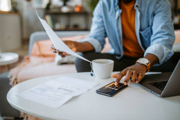 Man at home managing finances