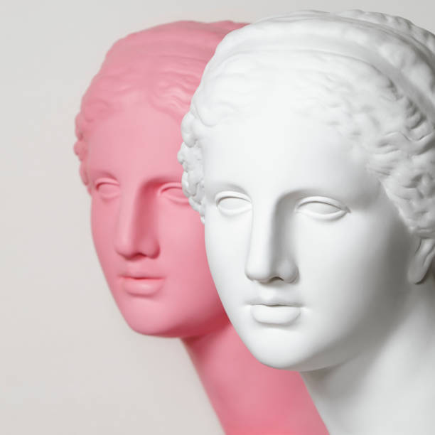 istock White and pink colored Greek Goddesses 1389554043