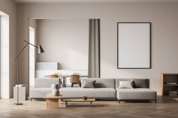 istock Bright living room interior with empty white poster, sofa 1389557838