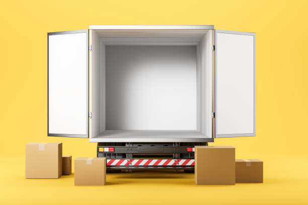 istock Empty trailer with cardboard boxes on the floor, shipment. Mockup 1389557932