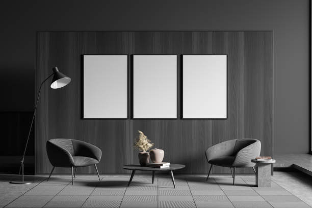istock Grey guest room interior with seats, coffee table and mockup posters 1389558028