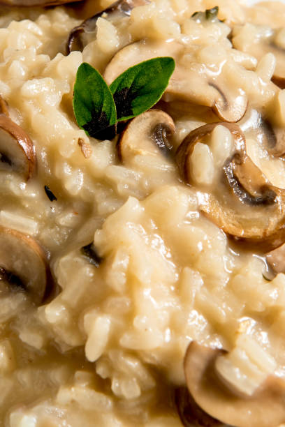 istock Risotto with mushroom texture background. 1389563822