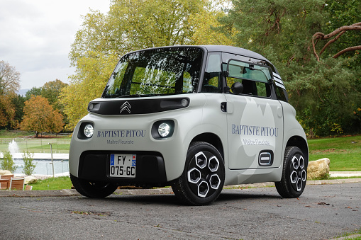 Paris, France - 22 October, 2021: Electric car Citroen Ami Cargo on a street. This model is the smallest car in Citroen offer.