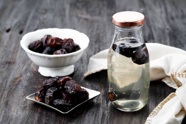 Kurma Nabeez, Date Fruit Overnight Infused Water in a Bottle, Popular Healthy Drink during Ramadhan. Kurma Nabeez, Date Fruit Overnight Infused Water in a Bottle, Popular Healthy Drink during Ramadhan. Prophet Favorite Drink. date palm tree stock pictures, royalty-free photos & images