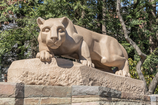 University Park-April 2, 2022: Nittany Lion Shrine was carved by Heinz Warneke located at the University Park campus of the Pennsylvania State University and was dedicated October, 1942 as a gift from the class of 1940.