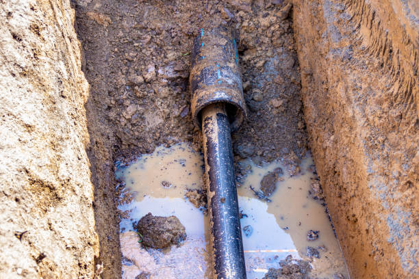 istock protection of a plastic pipe of an underground pipeline using a protective casing against increased external load 1389577797