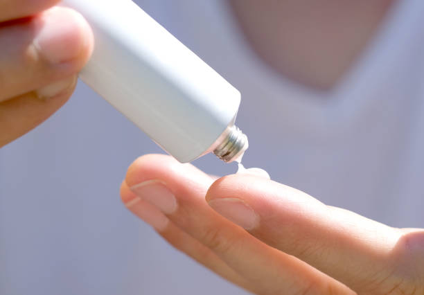 istock The woman's hand, she uses steroids Apply External type 1389580844