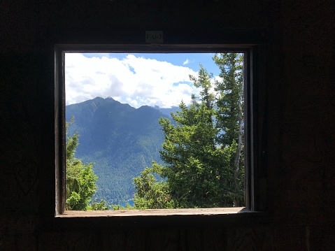 Window out on to beautiful mountain scenery
