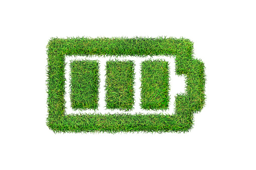 Battery icon from green grass. Eco charging icon isolated on white background. Symbol with the green lawn texture. Ecology symbol