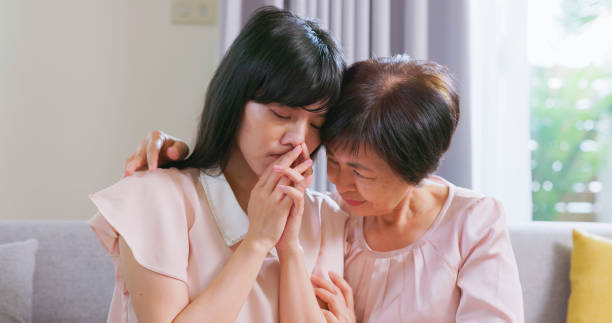 istock worried mother and sad daughter 1389591581