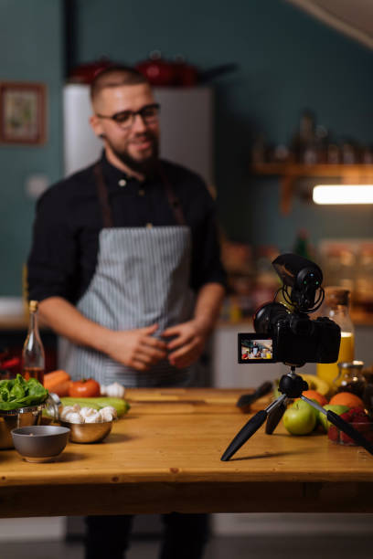istock Filming cooking recipe 1389592312