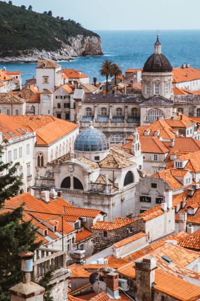 Daily Life in Dubrovnik Dubrovnik,Croatia,April 11th 2022: People walking on the street at old town in Dubrovnik, which is one of the most well known and popular cities in Dubrovnik. dubrovnik walls stock pictures, royalty-free photos & images