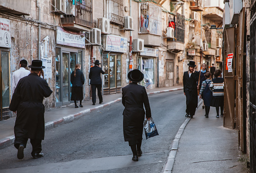 Jerusalem, Israel- April 30, 2022: Ultra-orthodox Jewish in the Mea Shearim neighborhood, Jerusalem, Israel., whis is also one of the most amazing things to see to travellers.