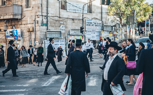 Jerusalem, Israel- April 30, 2022: Ultra-orthodox Jewish in the Mea Shearim neighborhood, Jerusalem, Israel., whis is also one of the most amazing things to see to travellers.