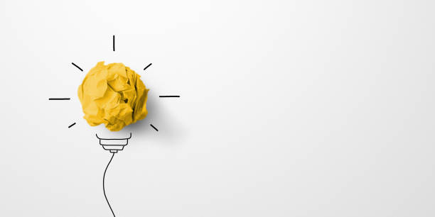 creative thinking ideas and innovation concept. paper scrap ball yellow colour with light bulb symbol on white background - light bulb business wisdom abstract imagens e fotografias de stock