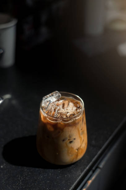 istock Glass of coffee on the table 1389612359