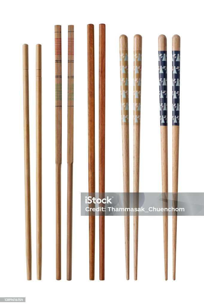 Chopsticks made from wood. Wooden chopsticks for Japanese and Chinese isolated on white background. with clipping path included. Chopsticks Stock Photo
