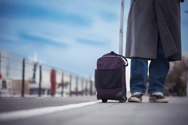 istock Traveling with Luggage 1389617622